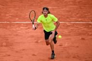 Stefanos Tsitsipas tracks down a ball at French Open 2025 | Image Source: Getty